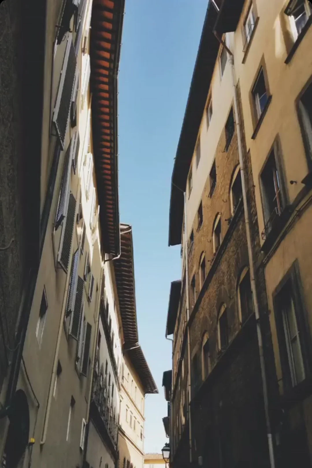Florence alley with open sky above